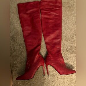 Red crocodile embossed guess mid thigh boots